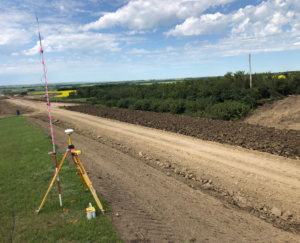 survey equipment on side of road construction